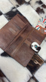O’hlay tooled leather and cowhide wallet