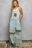Denim overalls with cheetah and floral patches
