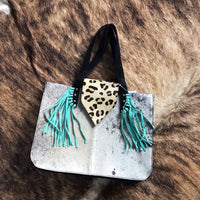 Cowhide and cheetah purse