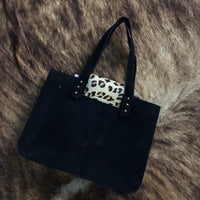 Cowhide and cheetah purse