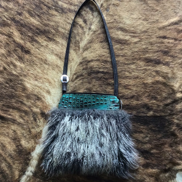 Fluffy hide and turquoise gator purse