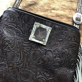Dark tooled leather purse